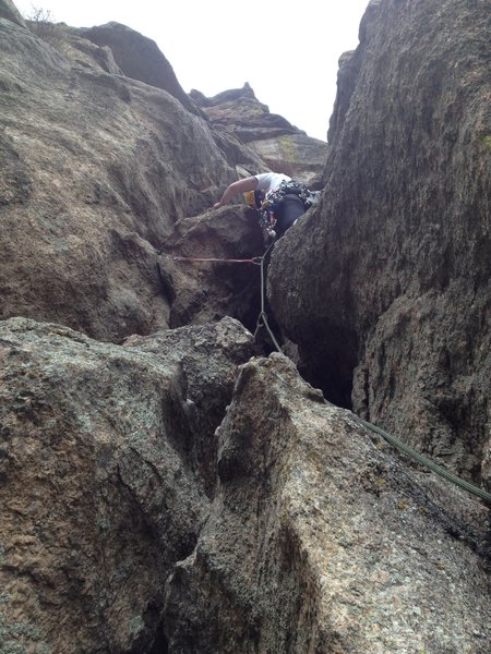 The chimney start of the last pitch.