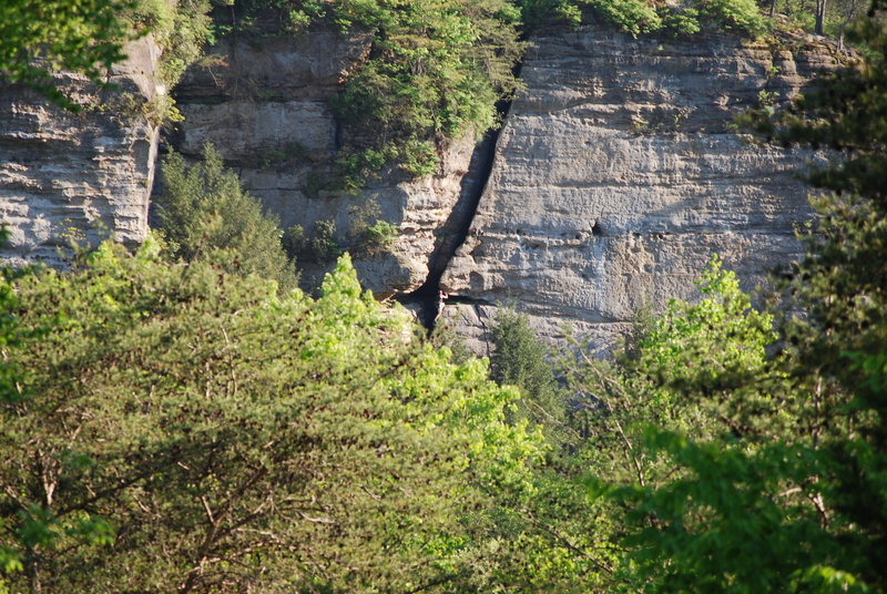 Haley Allen approaching the spacious heel hook crux midway up the route