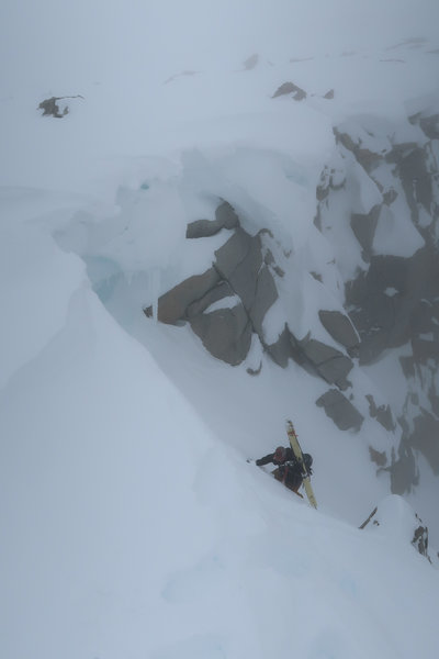 Topping out the Harrington Couloir in spring pow conditions (and poor visibility)