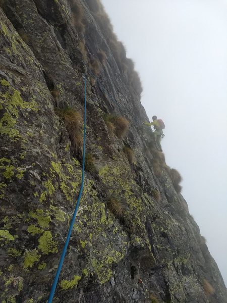 Sid about to round the corner near the end of the p2 traverse