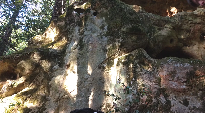 Biddles Gold" climbs the obvious line of thin crimps up to the huecos. Don't climb for a week after rain or you'll snap the holds off and will definitely get hurt.