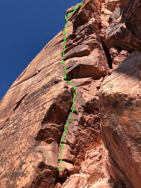 The route climbs the overhung off width onto a small ledge then continue's up as the crack get smaller. Then face climbing with a couple tricky moves gets you to a rappel station