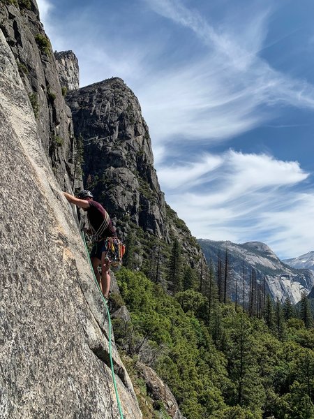 There's a step right off of the belay ledge at the end of p2, get your right foot on that and slowly stretch out until you can reach the handcrack for p3.