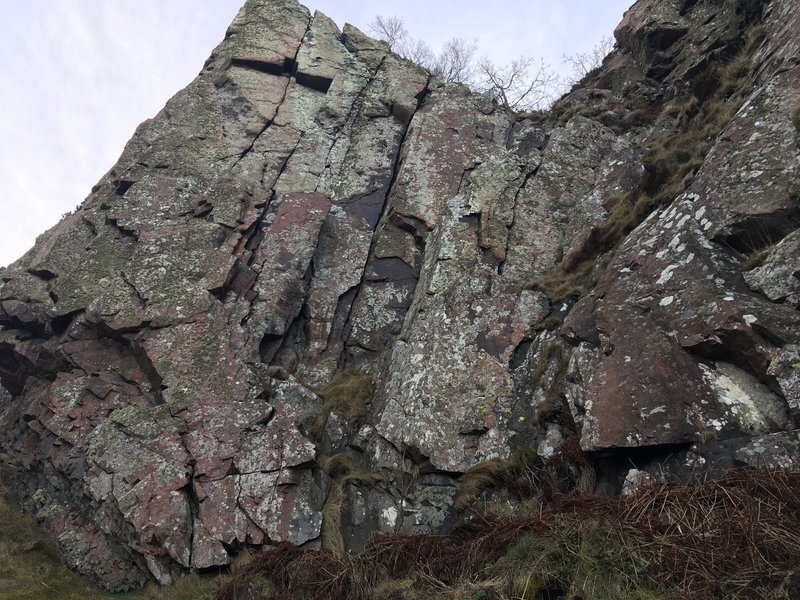 The Hyperborers Way. Route follows thin crack through small roof at left side of face.