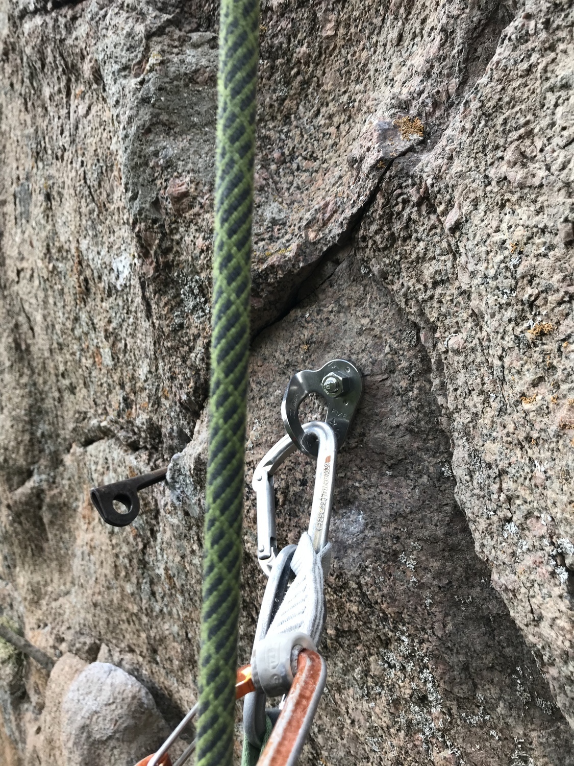 Replaced piton nest at first crux with new stainless bolt. Old pitons