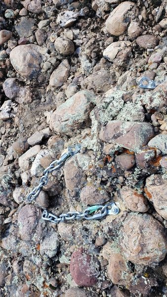 First rappell station. It might seem natural to rappell straight down, but you must follow the crack on the left side of you to prevent a terrible traverse. A 70m will reach to the ground from the second station.