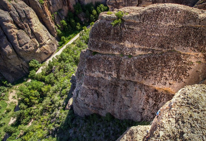 Working through the exposed crux of the route. All smiles.