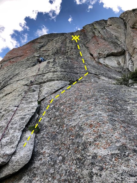 Bolt line going up and right away from the climber on Wind Dance