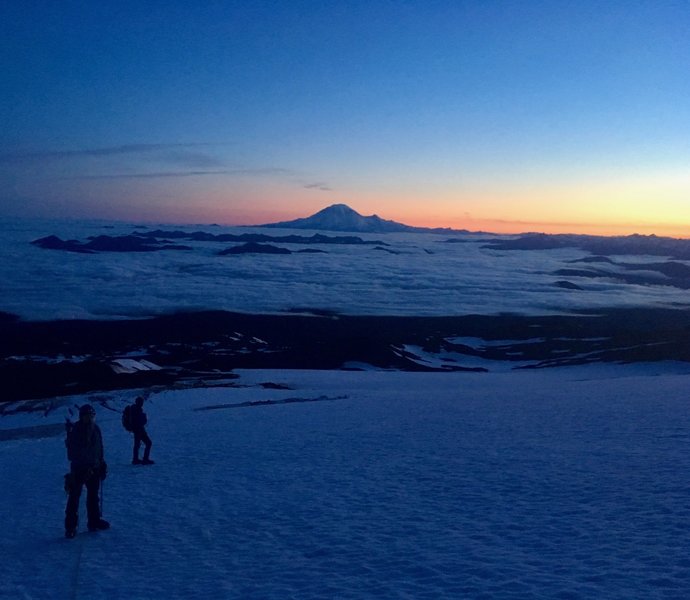 Alpine start June 2019 looking back at Mt. Rainier and the lower Adams Glacier