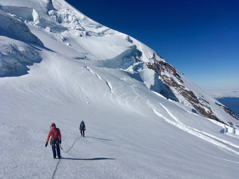 Traversing the upper portion of the Adams Glacier just before the final steep snow field (June 2019)