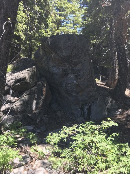 the most chalked up route on this boulder goes over a back breaking chunk of rock. So bring extra pads for the crux of the problem.