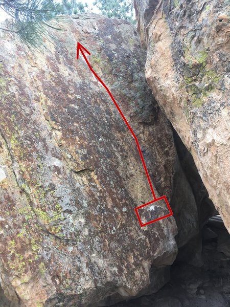 Start with your hands matched on the bottom ledge, make your way up the crack, and top out towards the left.