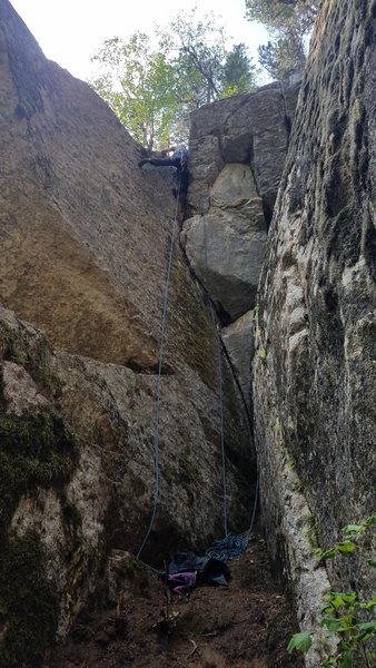 At bolt anchors, must go to the left for chains or up to tree for best lower/rappel.