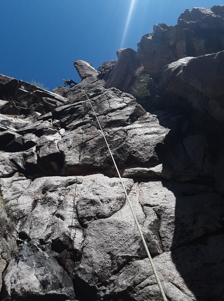 Climb the rope line for a 5.10 face or right for a 5.8 corner.