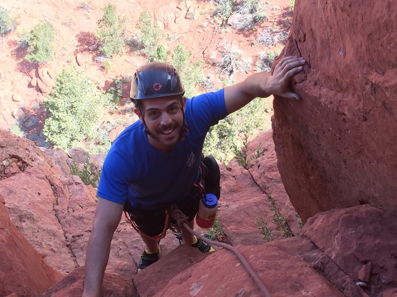 Zac joins me at the belay at the base of the double cracks.