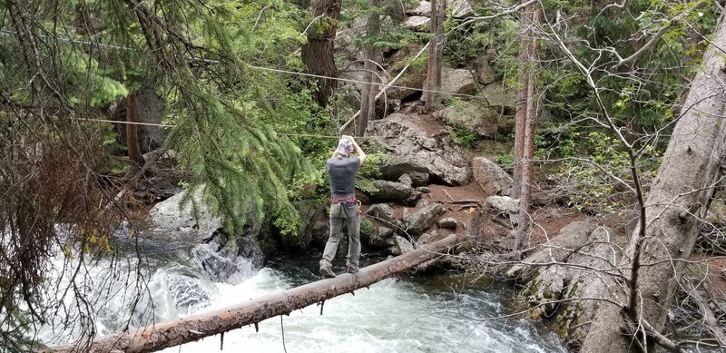 Kevin Hart on the Tyrolean traverse just upstream from Beaver Beach.