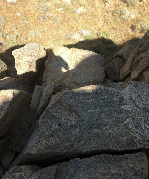 Pic of one set of hangars (sorry kinda hard to see) and the rock lip just beyond that you'll want to protect your rope from.
