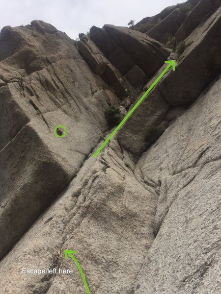Escape crux out left, this chickenhead is another supposed belay option, traverse up and right into the 'torpedo tube'
