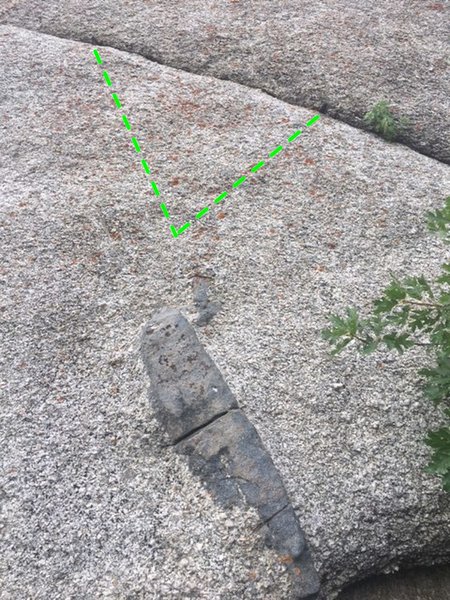 The final crux of pitch 6-- a gritty leftwards traverse (pins marked in green)