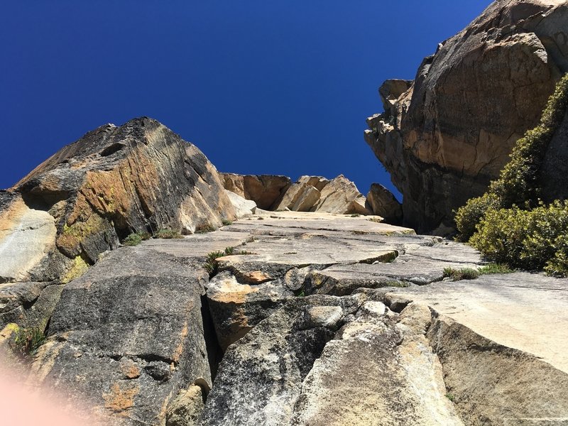 The route ft. finger. Head up the corner on the left and go right through the roof.