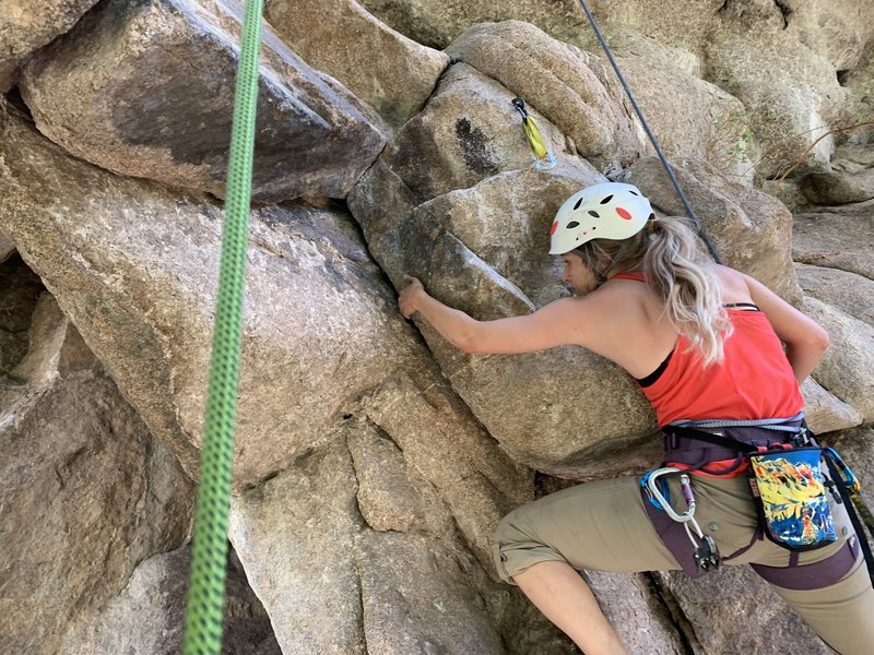 Laura making the start of the crux look easy.
