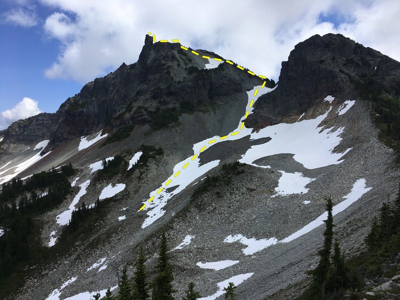 Unicorn Peak from the NW with the partially snow-filled approach couloir at center.