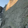 Climbers can be seen on the scramble to the beginning of the huge Cassin face, at the bottom of the picture.