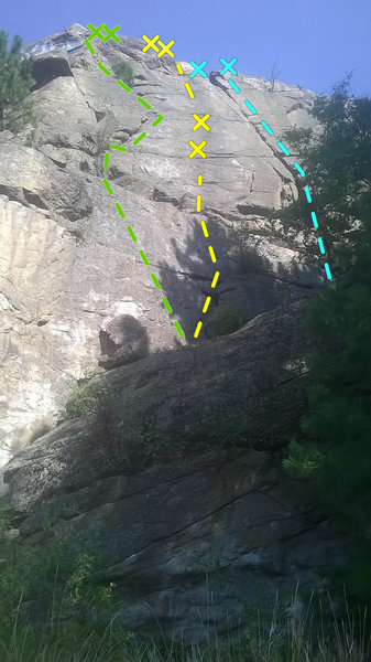 The belay is at the base in the shade on the pedastal.
<br>
<br>
Green: Crack Left of Main (5.7 Trad)
<br>
<br>
Yellow: Left of Main Crack Face (5.8ish Trad + 2 bolts)
<br>
<br>
Blue: Main Crack (5.7 or 8 crack)