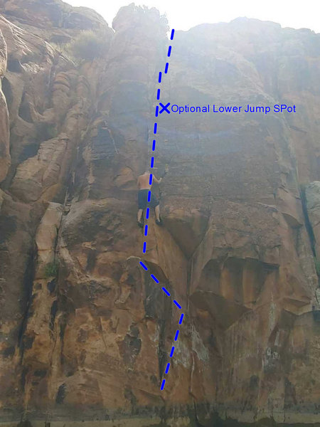 Left hand jamming in the main crack just above the crux jamb.