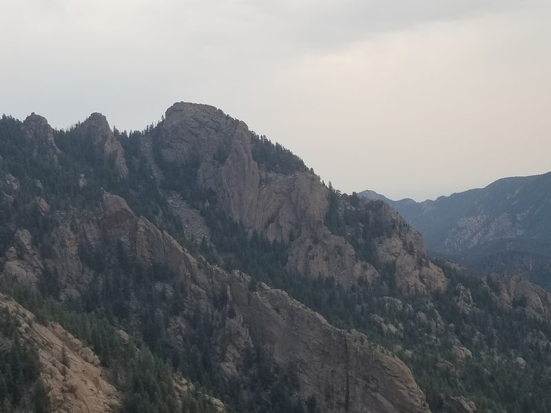 Vigil viewed from the west. The best climbs go up the arcing pillars. Go find it, and have fun.