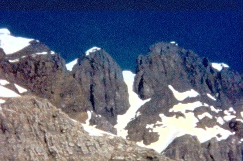 Photo 2 - The upper section of the East Face of the SE Ridge ("Arete") of Odaray from the E Face glacier. Once on the ridge, the difficulties are usually avoided by climbing the west side (opposite what you're viewing) of the ridge.