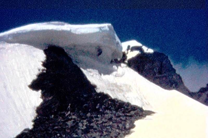 Photo 4 - Cornice along the SE Ridge ("Arete") of Odaray Like most obsticals on the ridge, this is circumvented to the left. (from Super 8 film)