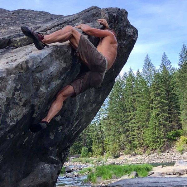 Struggling my way past the slopy crux, shorts and shoes wet from the failed first attempt. Gotta commit!