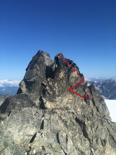 Traversing to the sub-summit of Austera. The usual sub-summit is on the right--you traverse to the face then climb around the corner, then up to the top. The last 30' or so is easy 5th class (can be readily down-climbed).