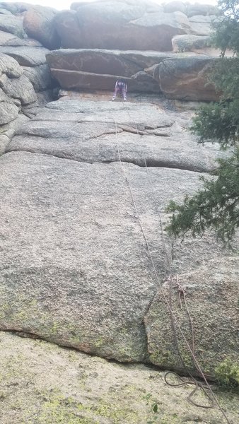 Emma about to rap. The left rope is clipped to the bolts.