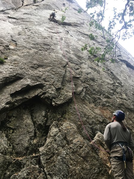Brendan S. belaying Andrew Upchurch on the first pitch of "76 degrees in the shade"