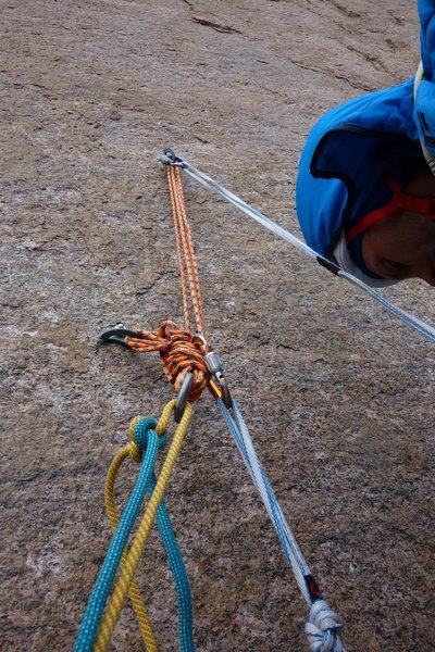 The bolted rap anchor at the top of pitch 4. I suspect several parties rappel from here (or lower). You can get down from here in four double-rope rappels off established bail anchors.