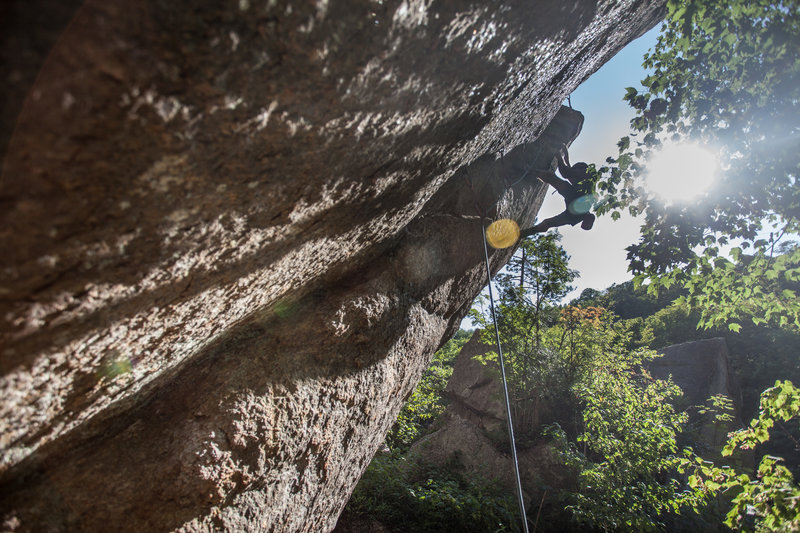 Sylvain Massé attemping a redpoint