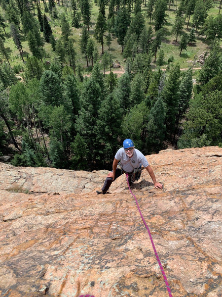 Alan just after the crystal alcove below the start of P2 belay.