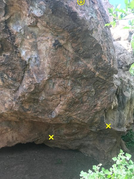 The route on the northeast corner. Xs are the starting holds with large, flat, diagonal edges facing toward camera.