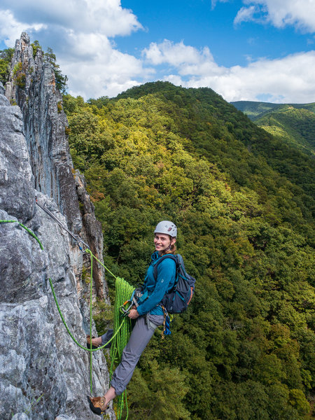 Hanging belay on the east face off of bolts after P1