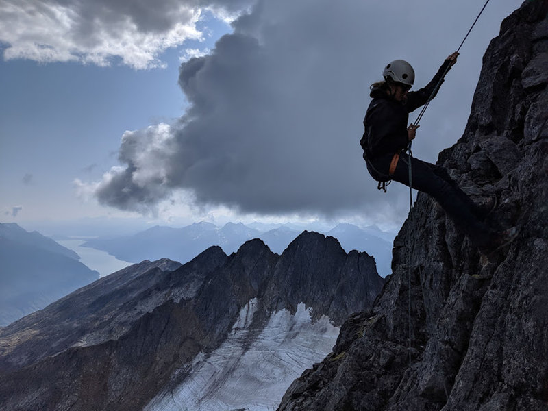 1st Rap of the Summit Spire & Good Views of Lynn Canal. That is South, looking towards Haines, AK. You can make it down to the Base of the climb with a single Rap on a 60m rope. There is a single sling at the top of the Spire.