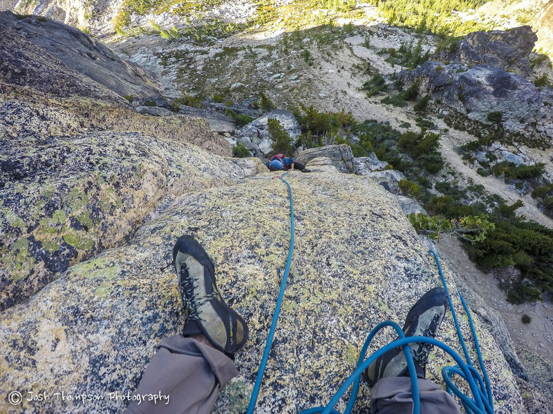Top of the second pitch looking down. It's a small ledge perfect to sit on. Sling the rock under your butt for your anchor.