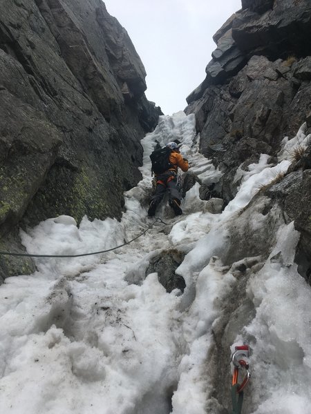 Climbing the crux in sketchy, rotten late-season conditions. June 2019 (NOT RECOMMENDED).
