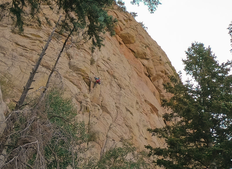 About halfway up P1 of the West Ridge. Escaping this small roof to the right felt like the crux to me.