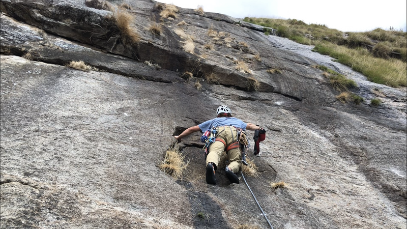 Scott adding some bolts on lead during the FA