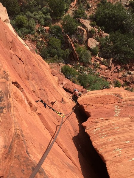 Ian ledge humping his way to P1 anchor. Easy (5.5ish) on this last bit.