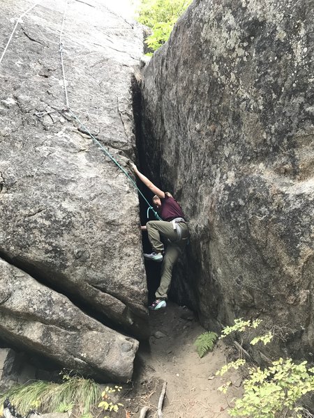 Lauren exits the chimney start and pulls up onto face