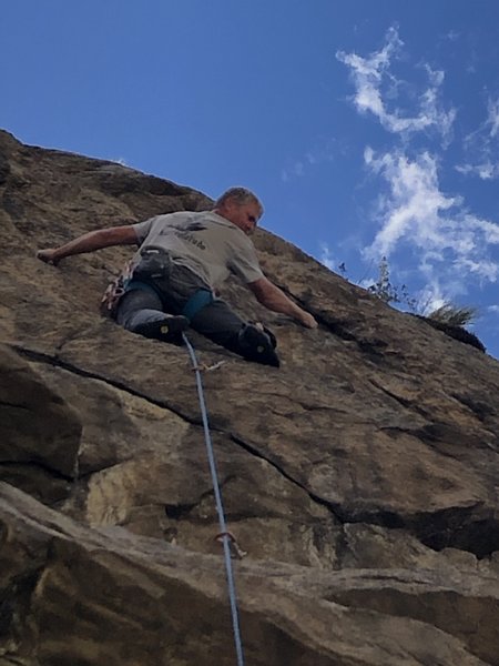 Just above the 4th bolt.