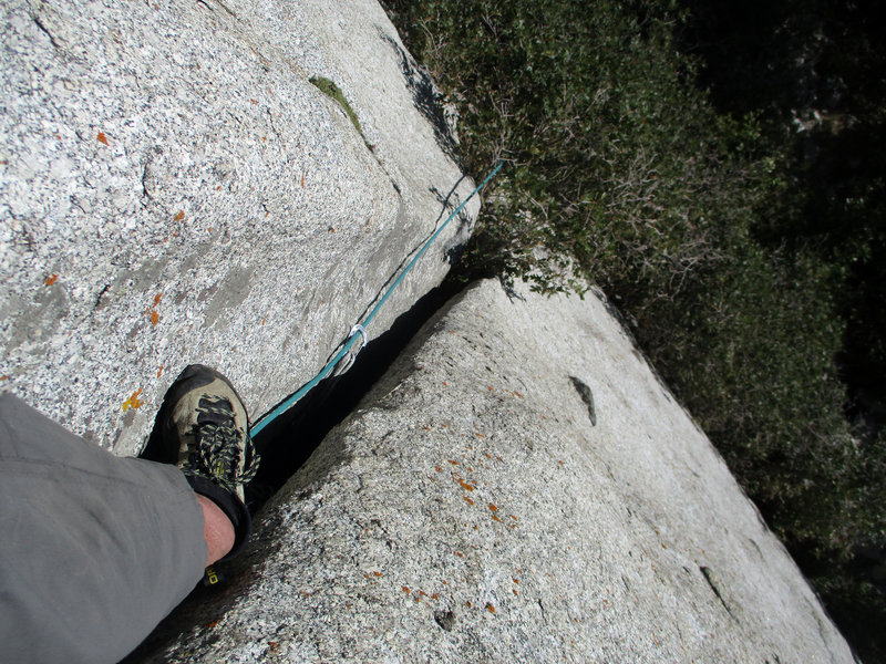 Looking down at the end of the #5 C4 section. There are some good knobs here to turn left-side in briefly while getting started with the #6 C4 that you'll push for the remainder of the climb.